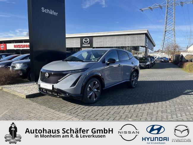 Nissan Ariya 394 PS e-4ORCE 87 kWh Evolve+ Pack Voll Nappa Pano Bose - Bild 1