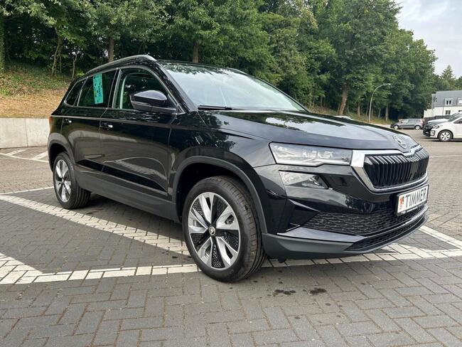 Skoda Karoq 1.5 TSI DSG Selection *PANORAMA*AHK*SOFORT* - Bild 1